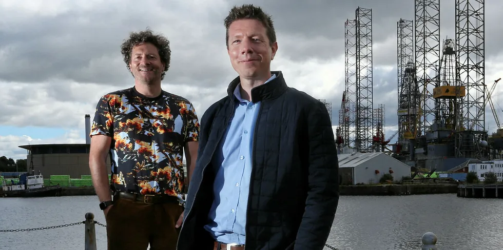 Nathan Pyne-Carter CEO of fish stunner startup Ace Aquatec with Chris van der Kuyl of video game developer 4J Studio at the Water's Edge, Dundee.