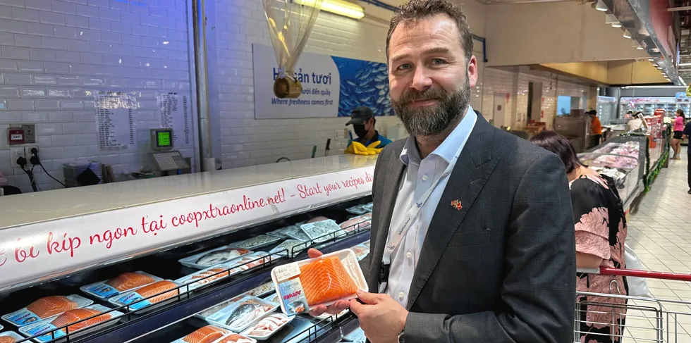 Orjan Kjaervik Olsen, country manager for new markets in the Norwegian Seafood Council visits a Vietnamese supermarket. The package says "Nauy" which means Norway.