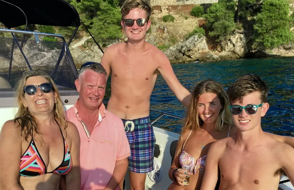 Going nowhere: SBM whistleblower Jonathan Taylor with his family in Croatia