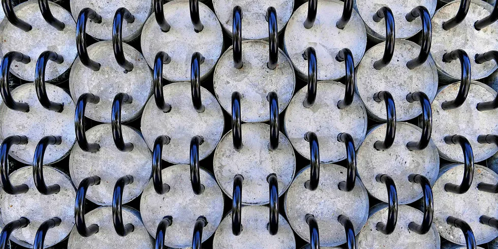 EnergyNest's thermal battery, consisting of steel pipes running in and out of long cylinders of 'Heatcrete'.