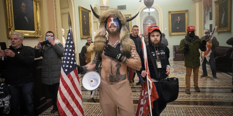 A pro-Trump mob confronts U.S. Capitol police outside the Senate chamber of the U.S. Capitol Building on January 06, 2021 in Washington, DC.