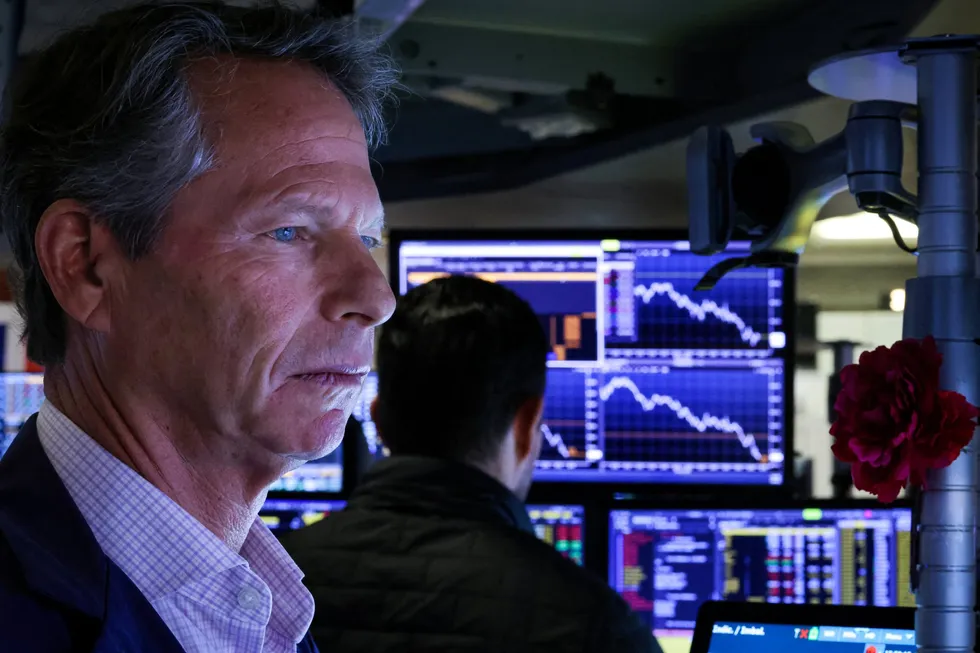 Traders work on the floor at the New York Stock Exchange (NYSE) in New York City, US, on Tuesday, 8 April 2025.