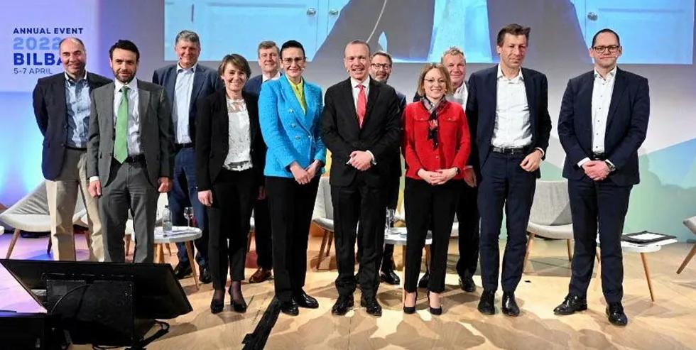 Signatories of the joint statement gather on stage at WindEurope 2022, including Cordi O'Hara (in red) and Chris Peeters (second from right).