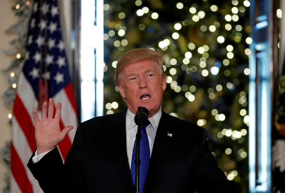 Awaiting signature: US President Donald Trump delivers a speech on tax reform legislation at the White House in Washington