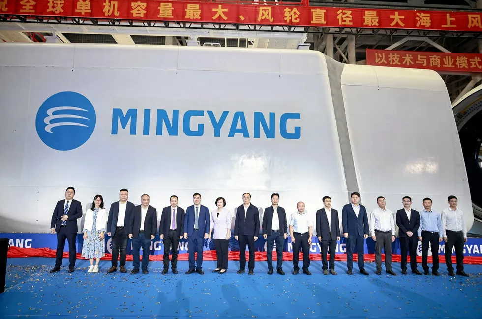 Mingyang staff unveiling a turbine at its Shanwei manufacturing base in China.