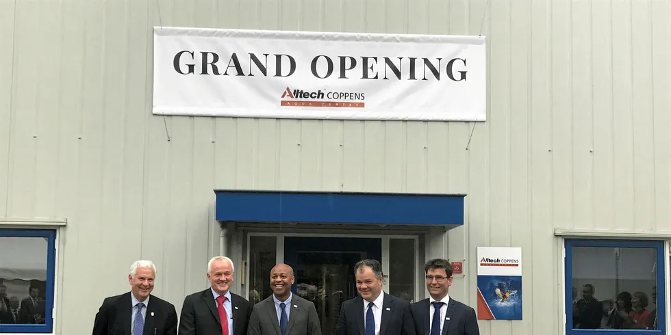 The ribbon cutting at Coppen's revamped research center.