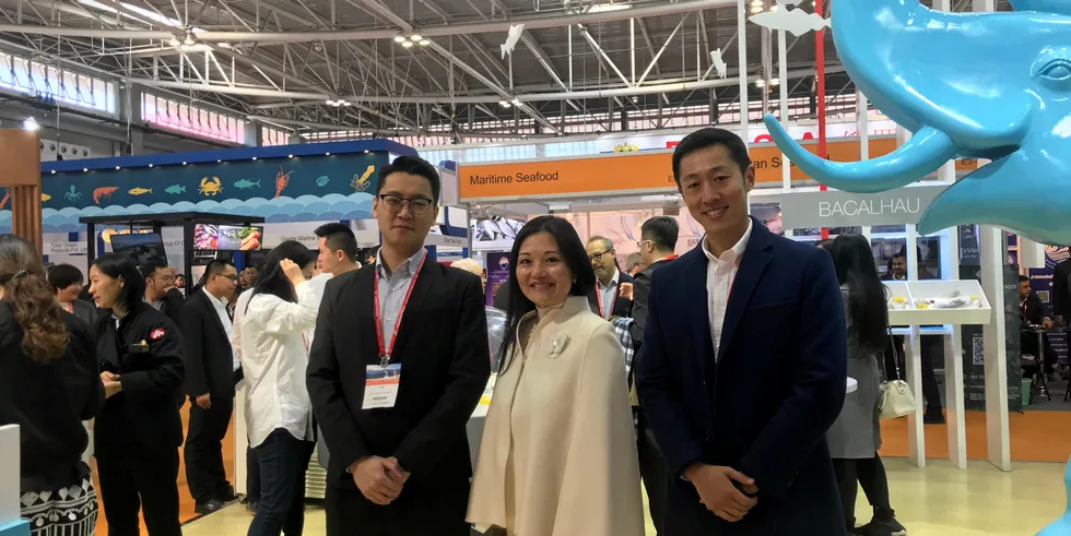 Jessie Ng, (center) executive director and CEO of China Fishery Group, stressed that the plan is an initiative taken by the ad hoc group of creditors and "not in conjunction with the board."