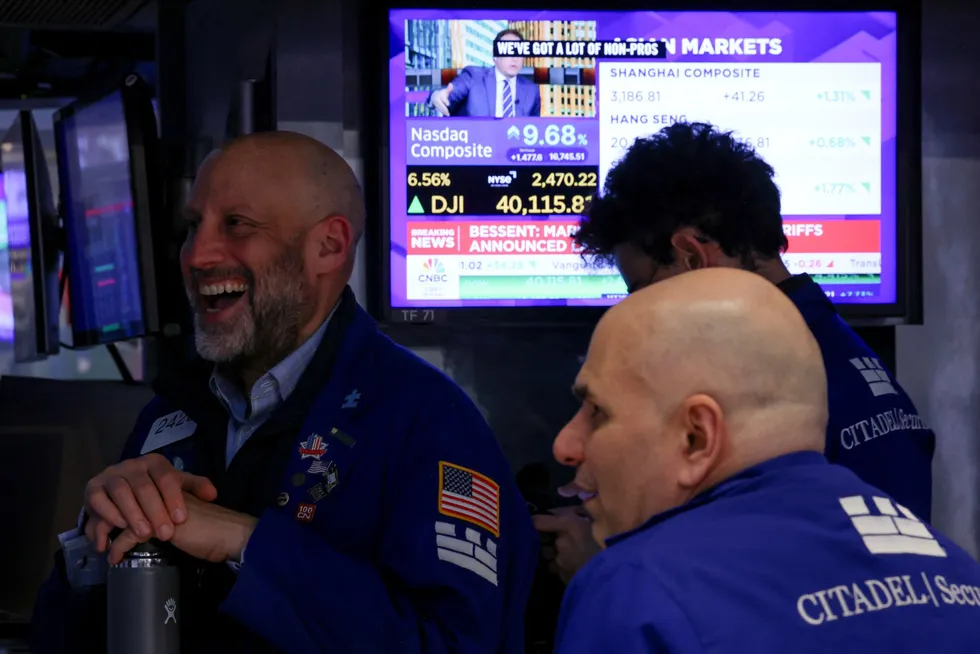 Traders work on the floor at the New York Stock Exchange (NYSE) in New York City, US, after the White House announced a 90-day pause & lowered 10% reciprocal tariff for other countries, on Wednesday, 9 April 2025.