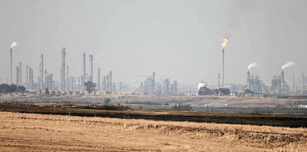 A picture taken on September 6, 2018 in Secunda shows the SASOL Secunda CTL that uses coal liquefaction to produce petroleum-like synthetic crude oil from coal.