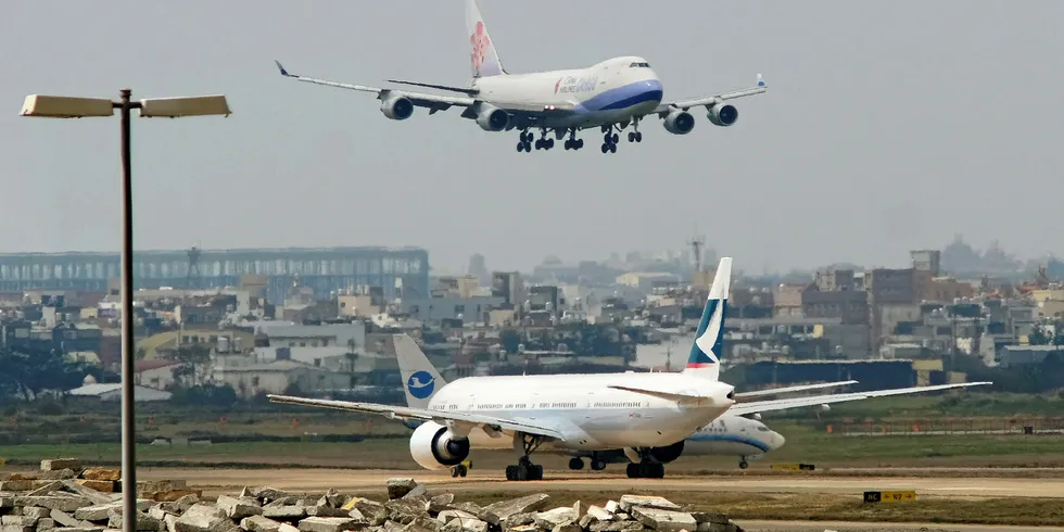 Aircraft landing at Taiwan's busy Taoyuan International Airport