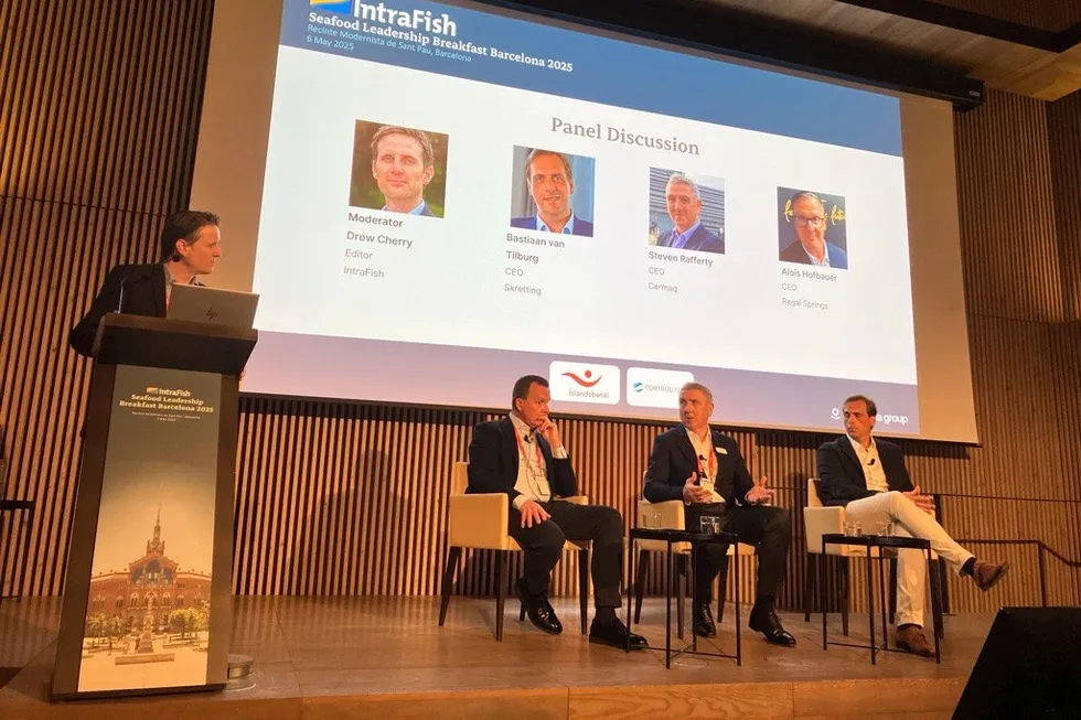 Alois Hofbauer, CEO of Regal Springs; Cermaq CEO Steven Rafferty; and Skretting CEO Bastiaan van Tilburg join a panel discussion with IntraFish's Drew Cherry at the IntraFish Leadership Breakfast in Barcelona.