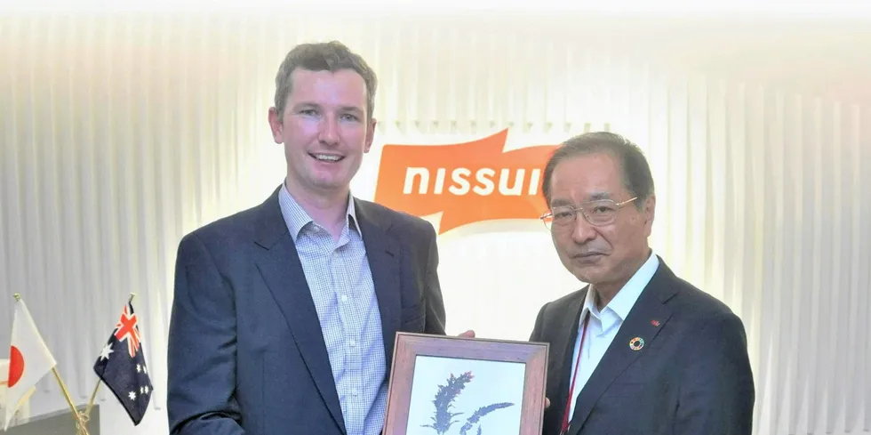 Immersion Group CEO Scott Elliott (right) and Nissui President Hamada (left).