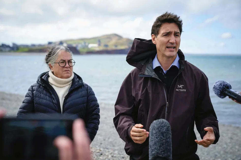 Justin Trudeau (right) speaking at a news conference with Diane Lebouthillier, fisheries minister for Canada, in 2023.