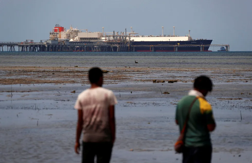 Future talks: a carrier docked at the marine facility of the ExxonMobil-operated LNG plant at Caution Bay