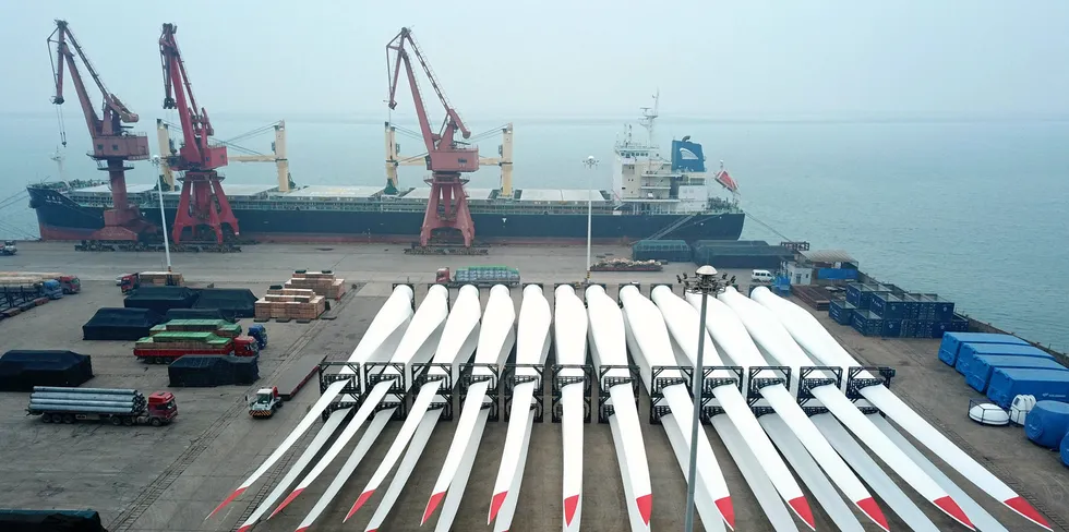 Aerial view of wind turbine blades to be shipped aboard at Lianyungang Port, China.