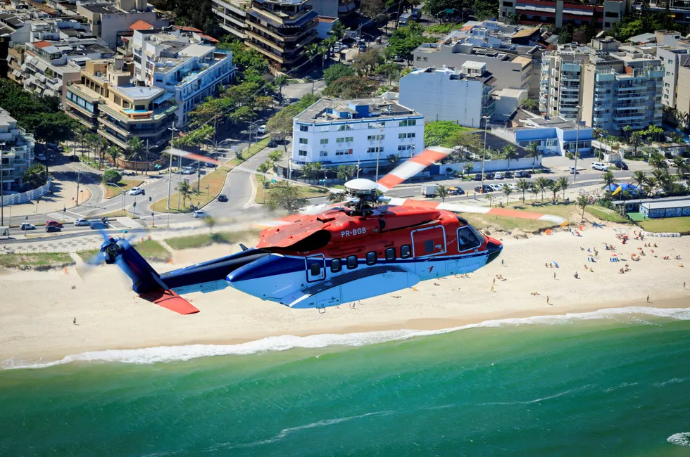 A Sikorsky helicopter from CHC flying over Rio de Janeiro in Brazil.