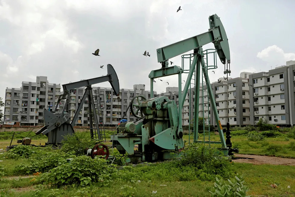 Ageing infrastructure: ONGC pumpjacks at an oilfield on the outskirts of Ahmedabad, India