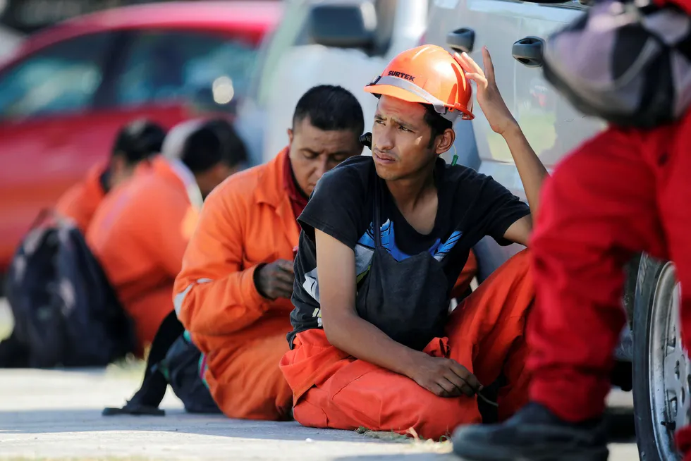 Tools down: workers of the Mexican state oil giant Pemex seen during a visit of President Andres Manuel Lopez Obrador to a refinery near Monterrey