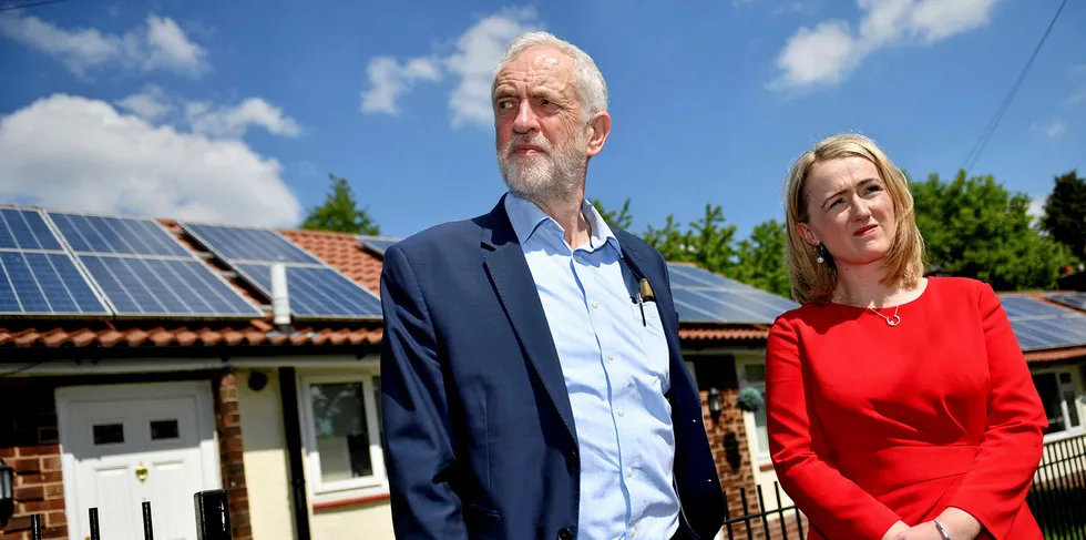 Labour Party leader Jeremy Corbyn and Rebecca Long Bailey MP, Shadow Business, Energy and Industrial Strategy Secretary, view houses with solar panels on Mereside Grove in Worsley on May 16, 2019 in Salford, England.
