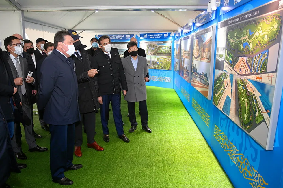 Planning ahead: Kazakhstan Prime Minister Askar Mamin listens to a presentation to convert Caspian town of Aktau into a large resort centre