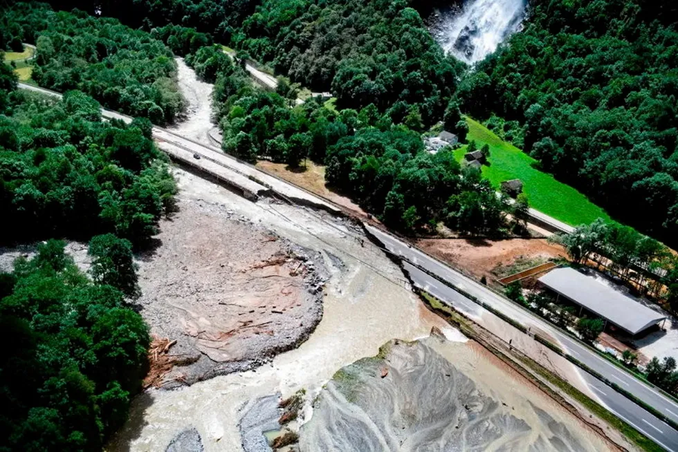 Land-based salmon farmer Swiss Lachs narrowly escaped damage from a landslide that has blocked a nearby highway.