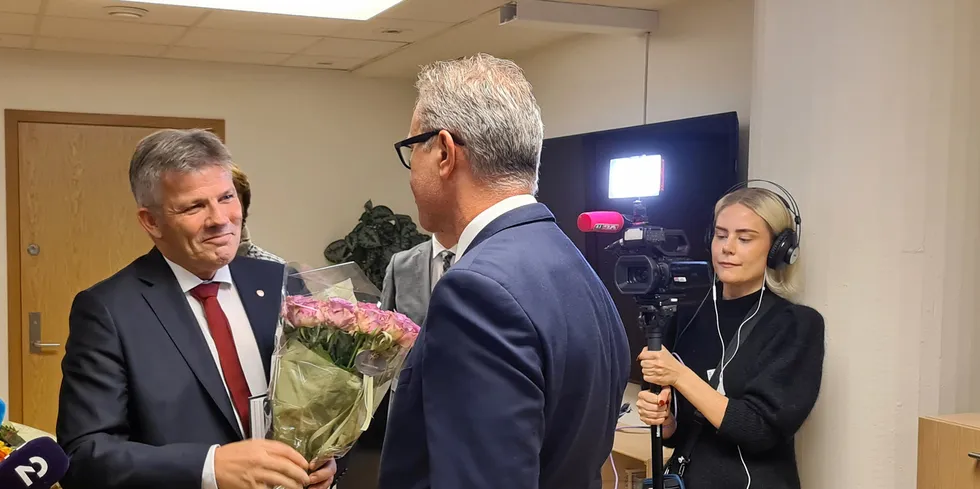 New fisheries minister Bjornar Skjaeran (left) with exiting minister Odd Emil Ingebrigtsen.