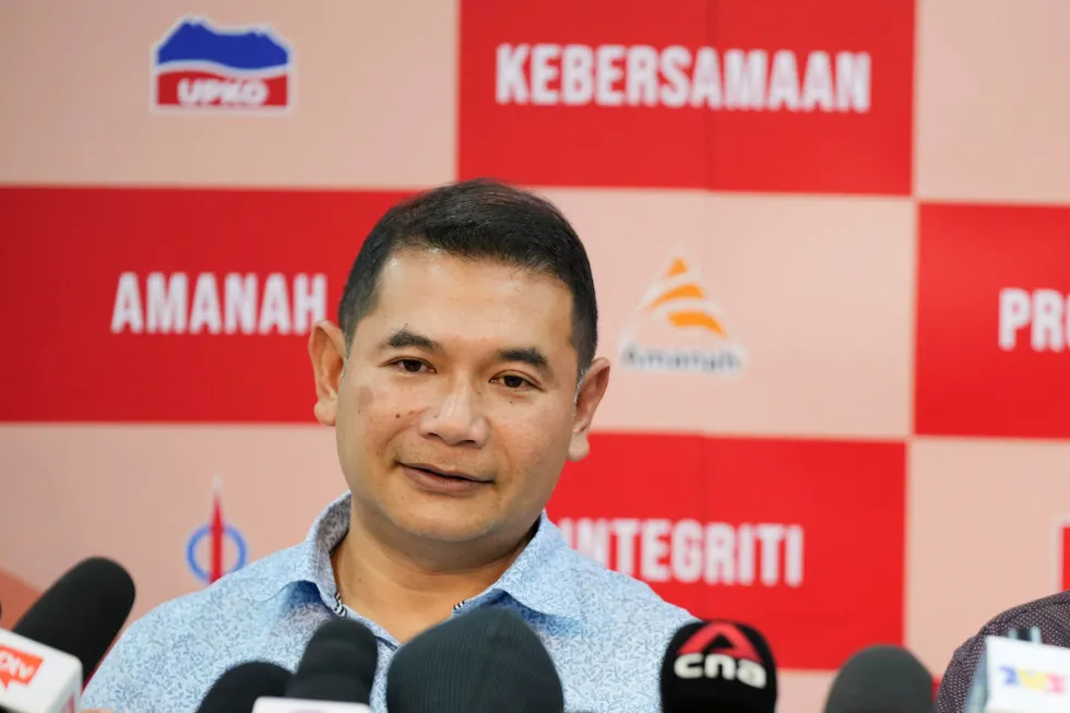 Malaysia's Prime Minister Anwar Ibrahim (right) and Economy Minister Rafizi Ramli (left).