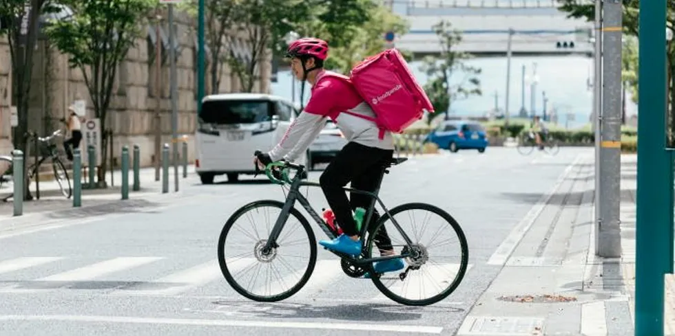 Wolf in sheep's clothing? A bicyclist delivers for aggregator Food Panda.