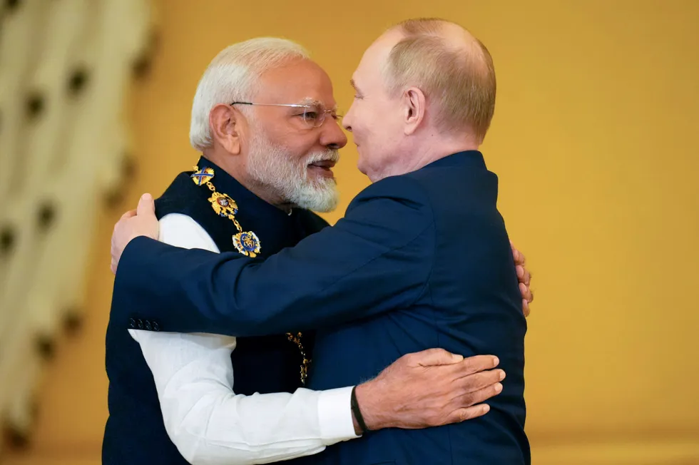 Russian President Vladimir Putin (right) presenting Indian Prime Minister Narendra Modi with an award in Moscow this week.