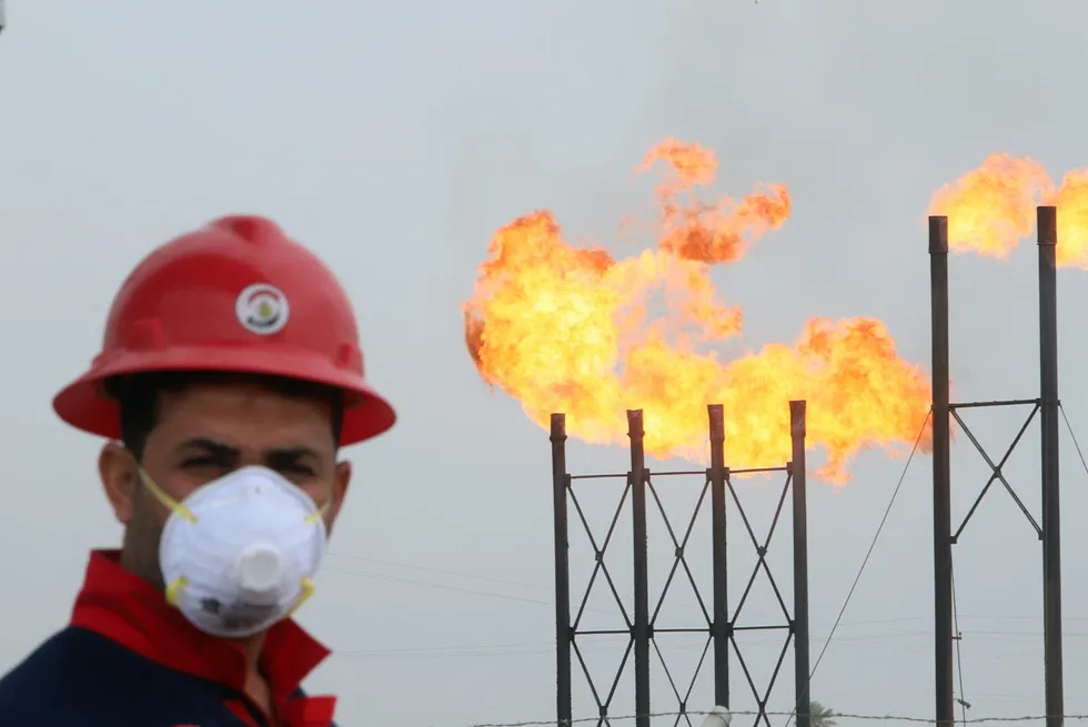 Flames emerge from flare stacks at an Iraqi oilfield.