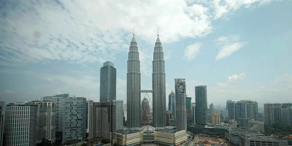 Landmark: Malaysia's Petronas Twin Towers in Kuala Lumpur . .