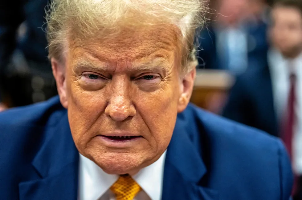 Former US President Donald Trump attends his trial for allegedly covering up hush money payments linked to extramarital affairs, at Manhattan Criminal Court in New York City.