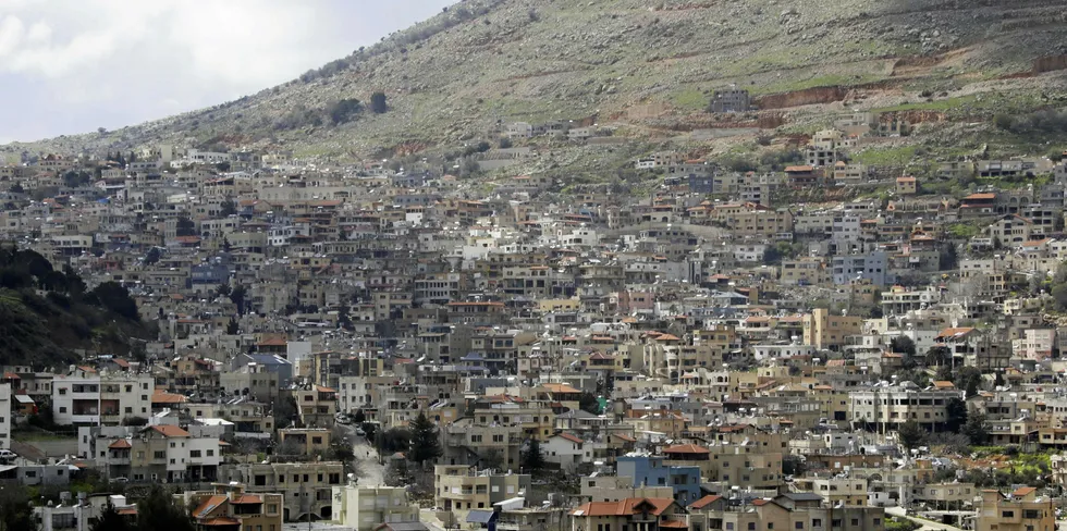 A picture taken from the Syrian town Ain al-Tineh shows the Druze town of Majdal Shams in the Israeli- annexed Golan Heights.