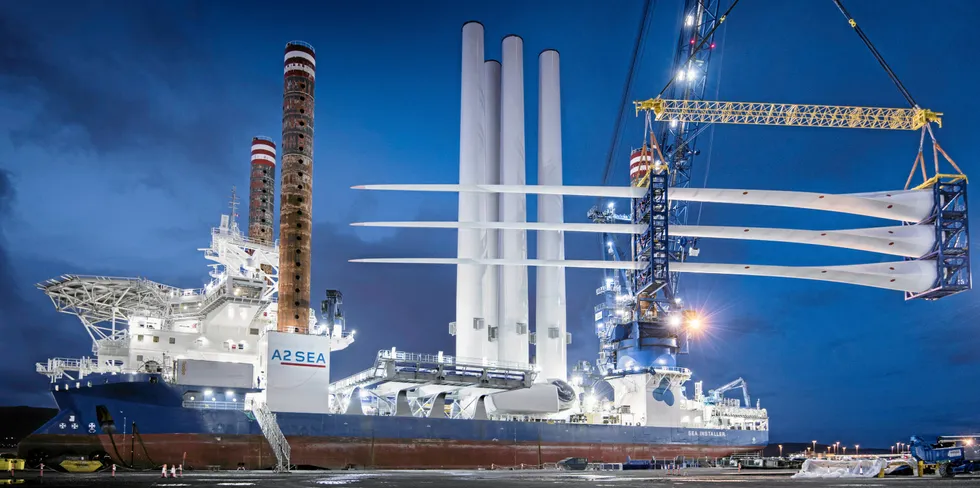 Blades are loaded onto wind turbine installation vessel in the UK