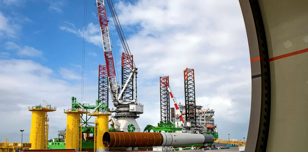 Deme Innovation being loaded in Sif's Rotterdam yard with foundations for the SeaMade wind farm off Belgium