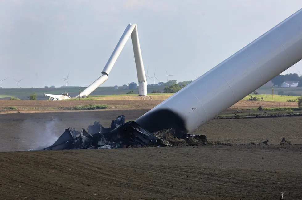 Wind turbines lie toppled in the aftermath of tornadoes which ripped through the area yesterday on May 22, 2024 near Prescott, Iowa.