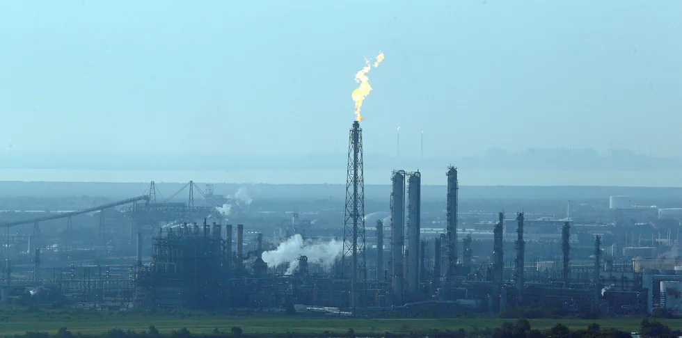 A flare stack puts out a flame at a refinery near Port Arthur, Texas