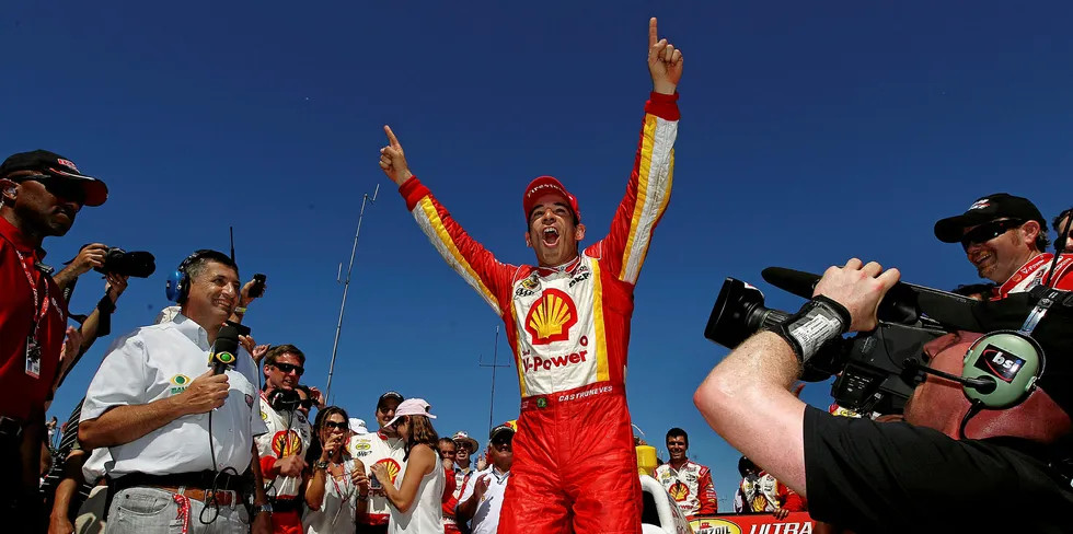 Helio Castroneves of Brazil, driver of the #3 Shell V-Power/Pennzoil Ultra Team Penske Chevrolet, celebrates winning the IZOD IndyCar Series Honda Grand Prix of St Petersburg.
