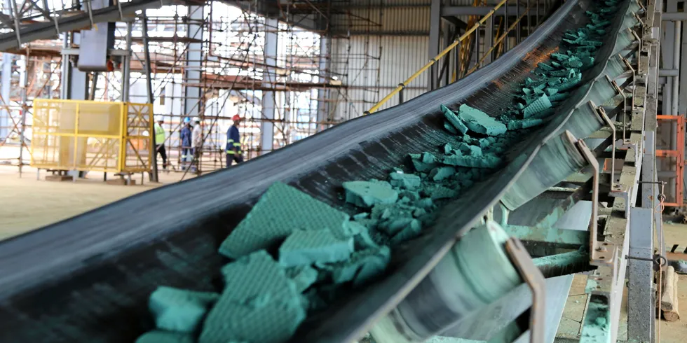 A conveyor belt carries chunks of raw cobalt in the Democratic Republic of Congo before being exported to China, to be refined.