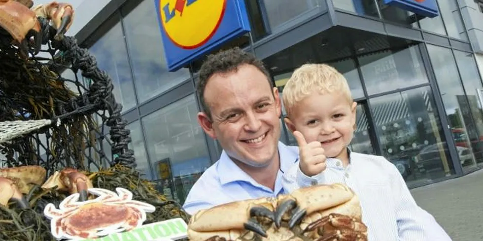 Retail sales manager Ryan Murphy celebrates deal with his son, Tommy.