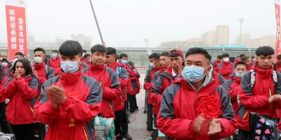 . A still from a video uploaded to a Chinese government Douyin account in 2023 depicting a labor transfer organized by the Kashgar authorities.