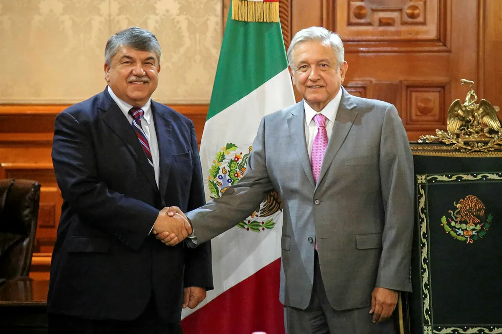 Aims: Mexican President Andres Manuel Lopez Obrador (right)