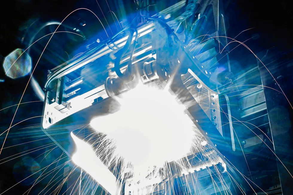 In situ: an image shows the subsea additive-manufacturing pipe repair technology at work using a Nautilus robot in a dry environment.