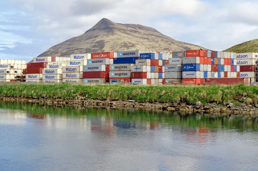 Containers are stacked at port of Dutch Harbor Alaska, waiting to be filled with Alaska seafood products to be shipped to markets in Asia.