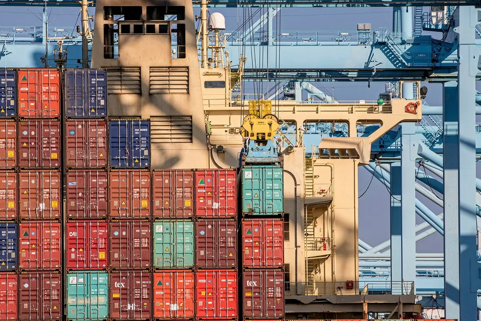 Stacked containers in the port of Los Angeles. Some importers are diverting to the US West Coast where possible.