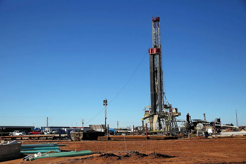 MIDLAND, TX - JANUARY 20: A fracking site is situated on the outskirts of town in the Permian Basin oil field on January 21, 2016 in the oil town of Midland, Texas. Despite recent drops in the price of oil, many residents of Andrews, and similar towns across the Permian, are trying to take the long view and stay optimistic. The Dow Jones industrial average plunged 540 points on Wednesday after crude oil plummeted another 7% and crashed below $27 a barrel. Spencer Platt/Getty Images/AFP == FOR NEWSPAPERS, INTERNET, TELCOS & TELEVISION USE ONLY ==