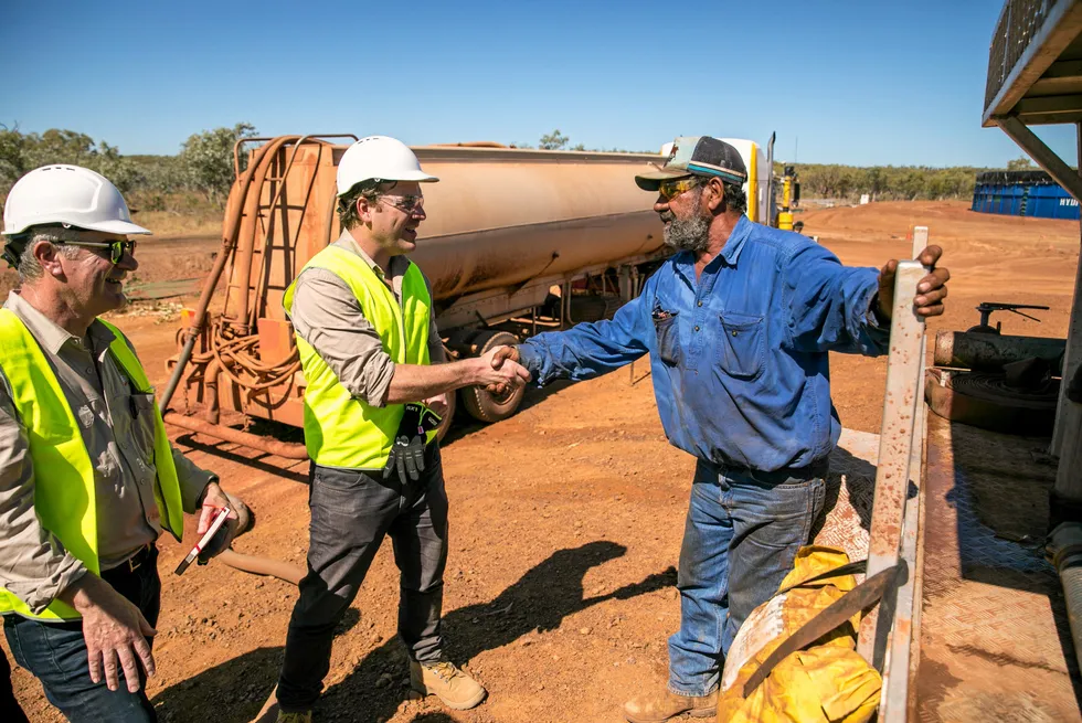 Empire Energy managing director, Alex Underwood, (centre).