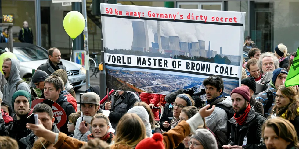 Demonstrators take part in a Climate March in Bonn ahead of COP23
