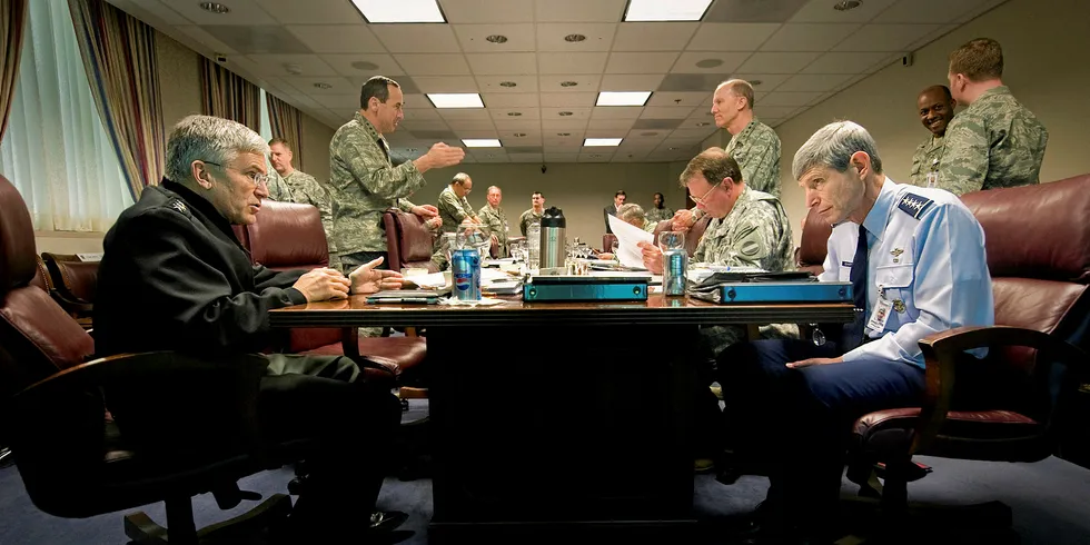 Senior US Army and Air Force staff in discussion at the Pentagon.