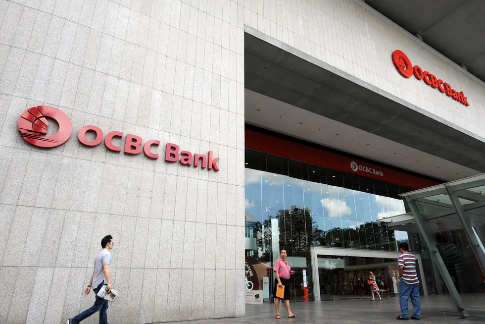 Banking giant: a man walks towards the Oversea-Chinese Banking Corporation building in Singapore.